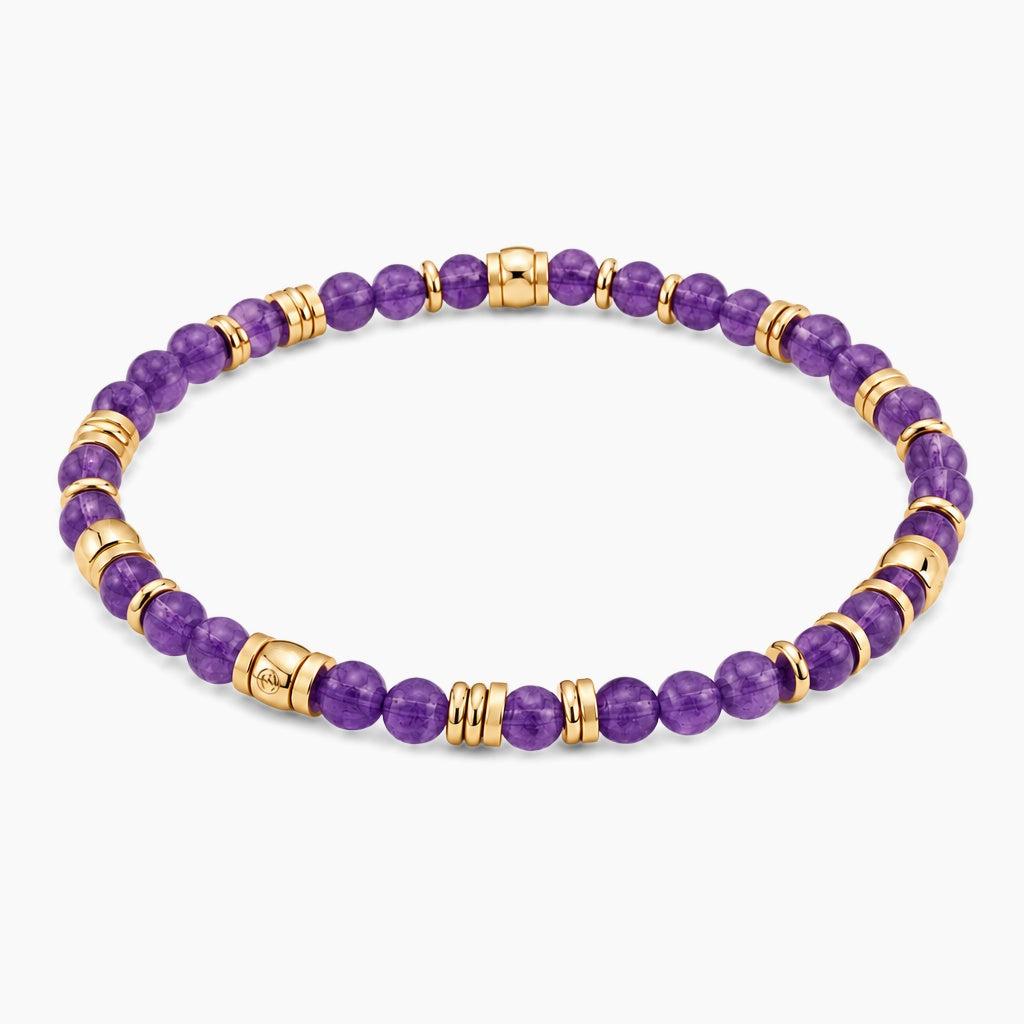 Amethyst Abundance Alignment Bracelet - angled view of gold and amethyst beaded stretch bracelet