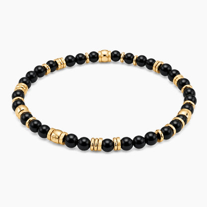 Black Obsidian Wealth Guardian Bracelet - angled view of gold and black obsidian beaded stretch bracelet