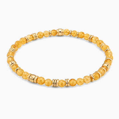 Citrine Money Magnet Bracelet - angled view of gold and citrine beaded stretch bracelet