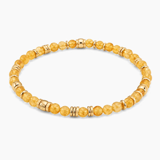 Citrine Money Magnet Bracelet - angled view of gold and citrine beaded stretch bracelet