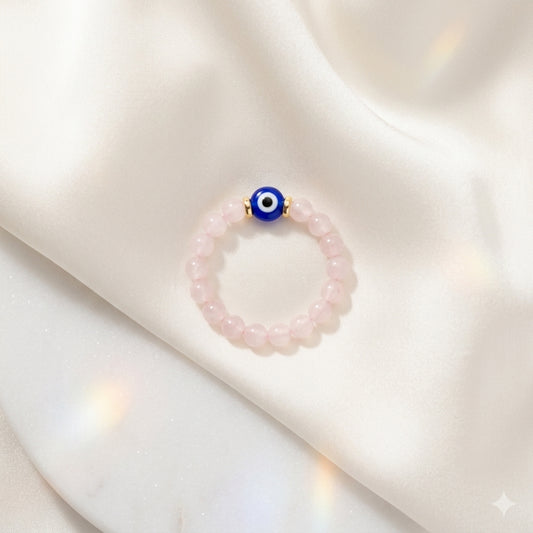 The Love Spell Rose Quartz Evil Eye Ring