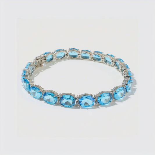 Blue Topaz Sterling Silver Tennis Bracelet – Clarity & Confidence